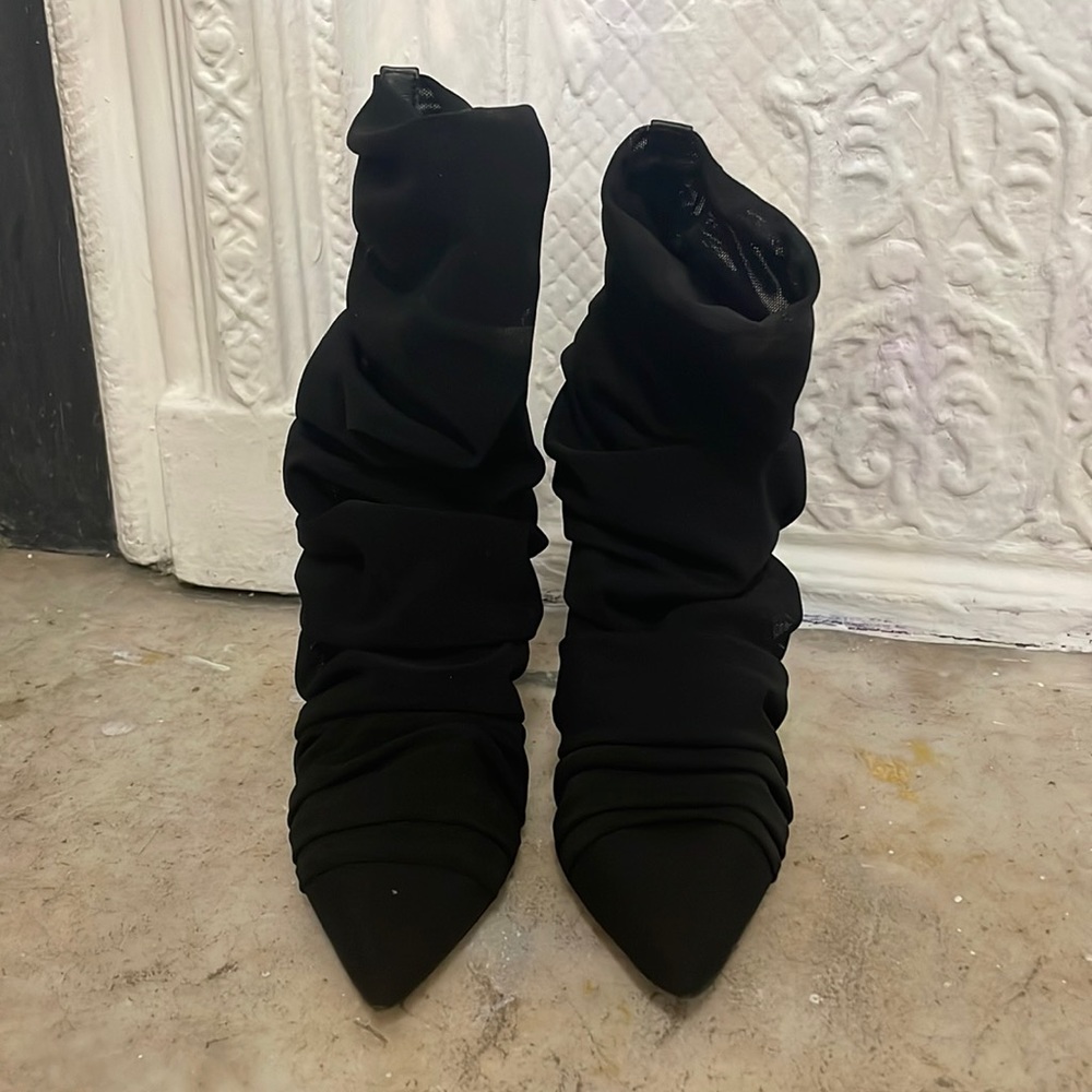 Black heeled booties by Alevi